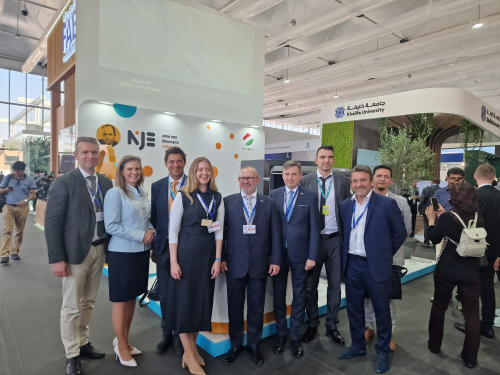 Csaba Lantos (Minister of Energy of Hungary), delegation of the Ministry of Energy of Hungary, and co-chairman Róbert Forintos visiting the stand of John von Neumann University at COP28.